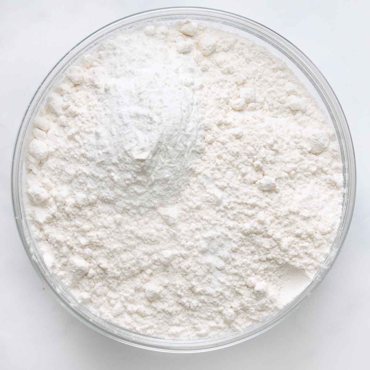 flour mixture for yellow cake in a glass bowl