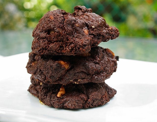 stack of chocolate decadence cookies on a white plate