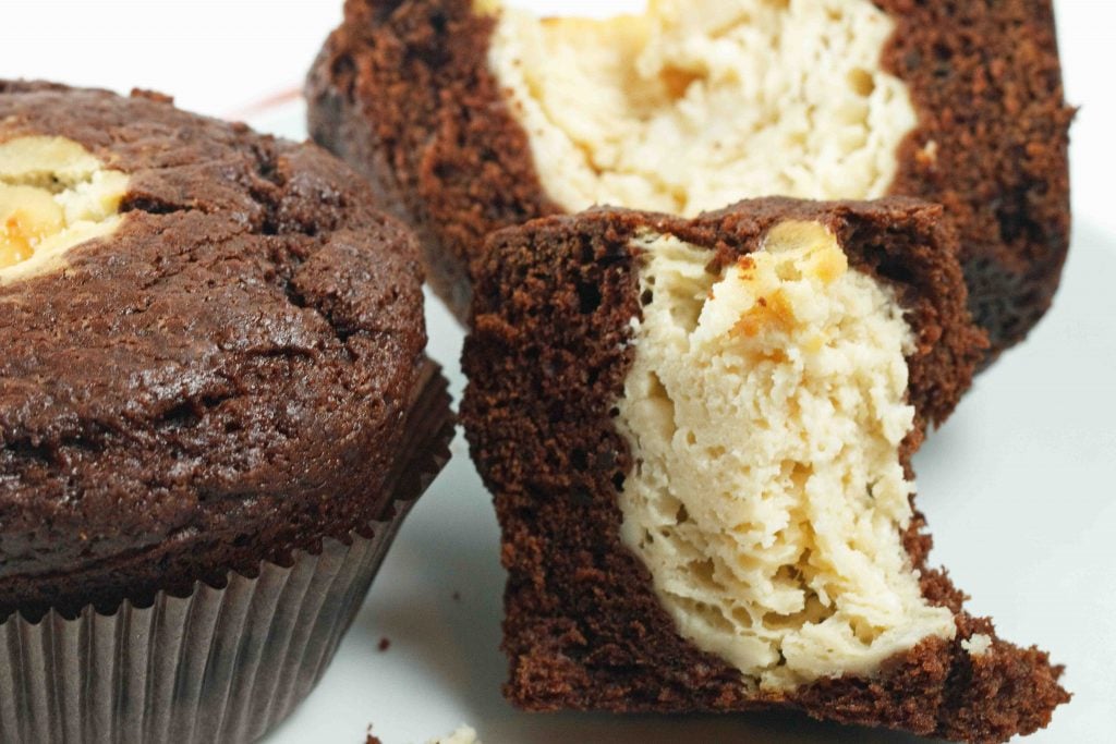 Black and White muffins sitting on a white plate