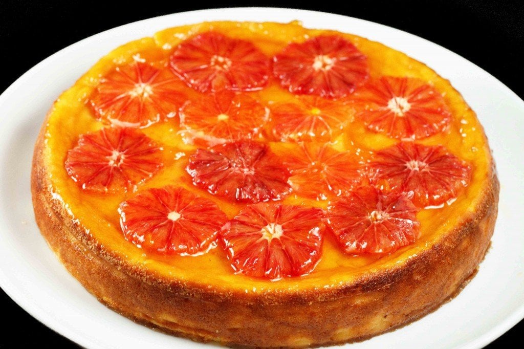 Ricotta cheesecake topped with blood oranges