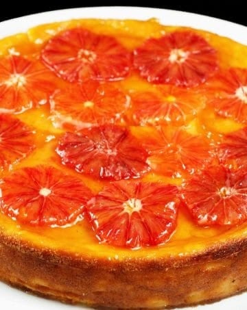 Ricotta cheesecake topped with blood oranges