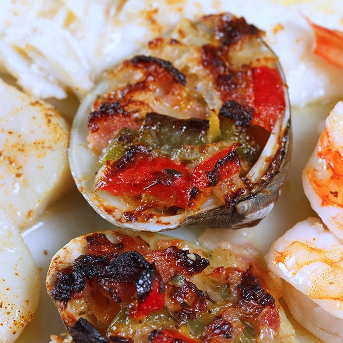 close up of clams casino on the broiled seafood combo