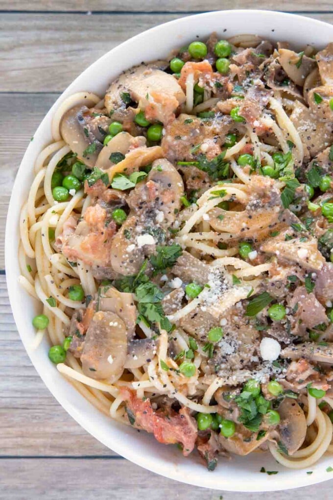 overhead partial view of spaghetti d'angelo in a white bowl