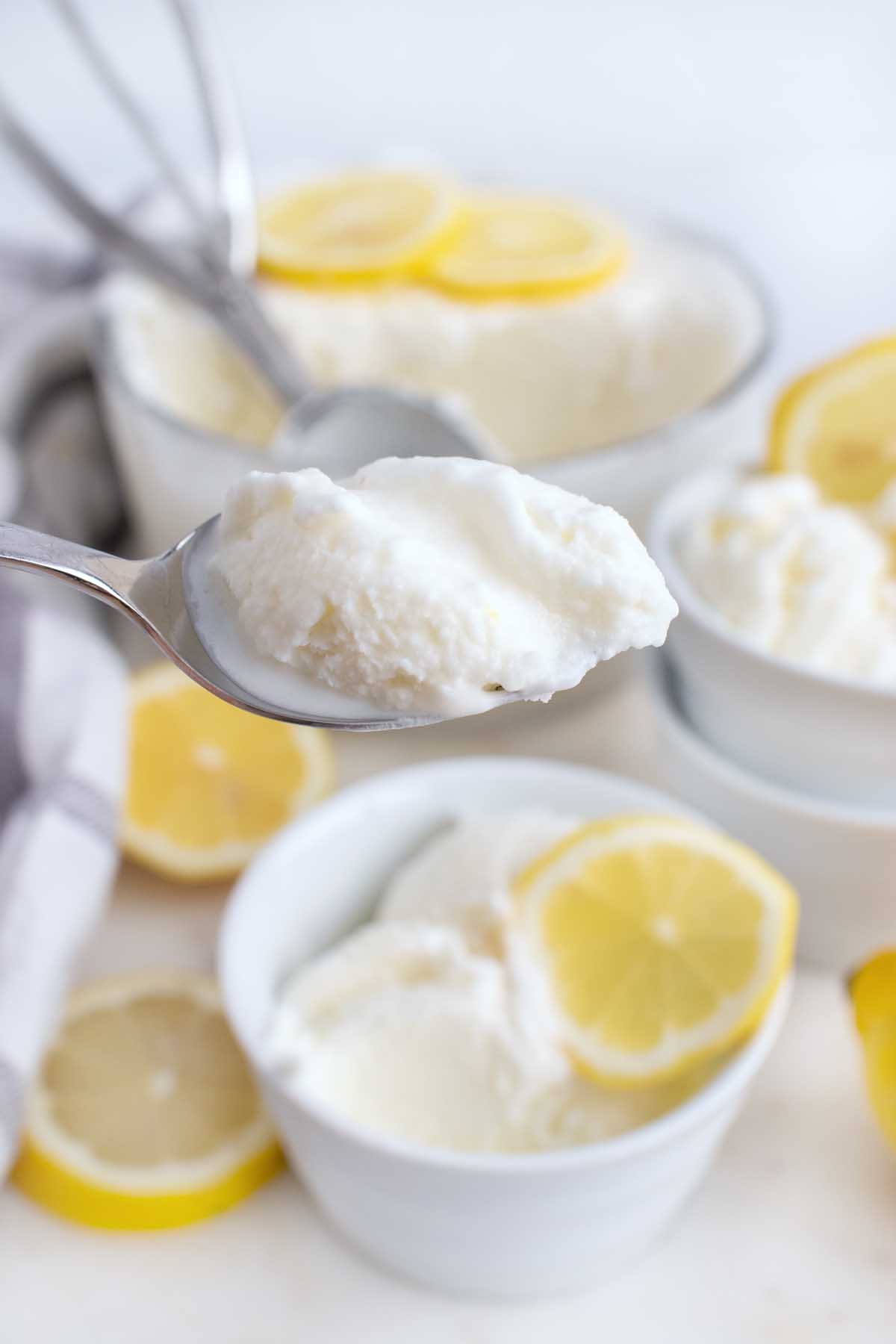 spoonful of lemon gelato above the dish of gelato