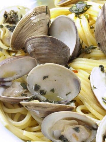 linguine and clams in a white bowl