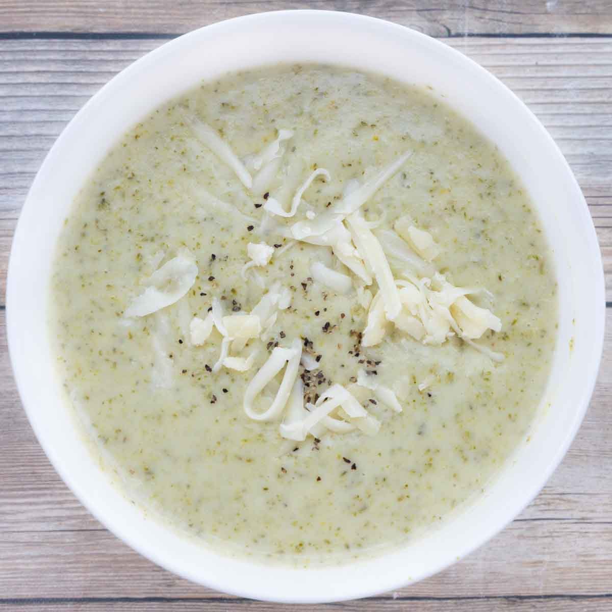 Broccoli Cheddar Soup in white bowl.