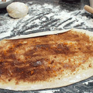 pastry dough topped with orange cinnamon topping