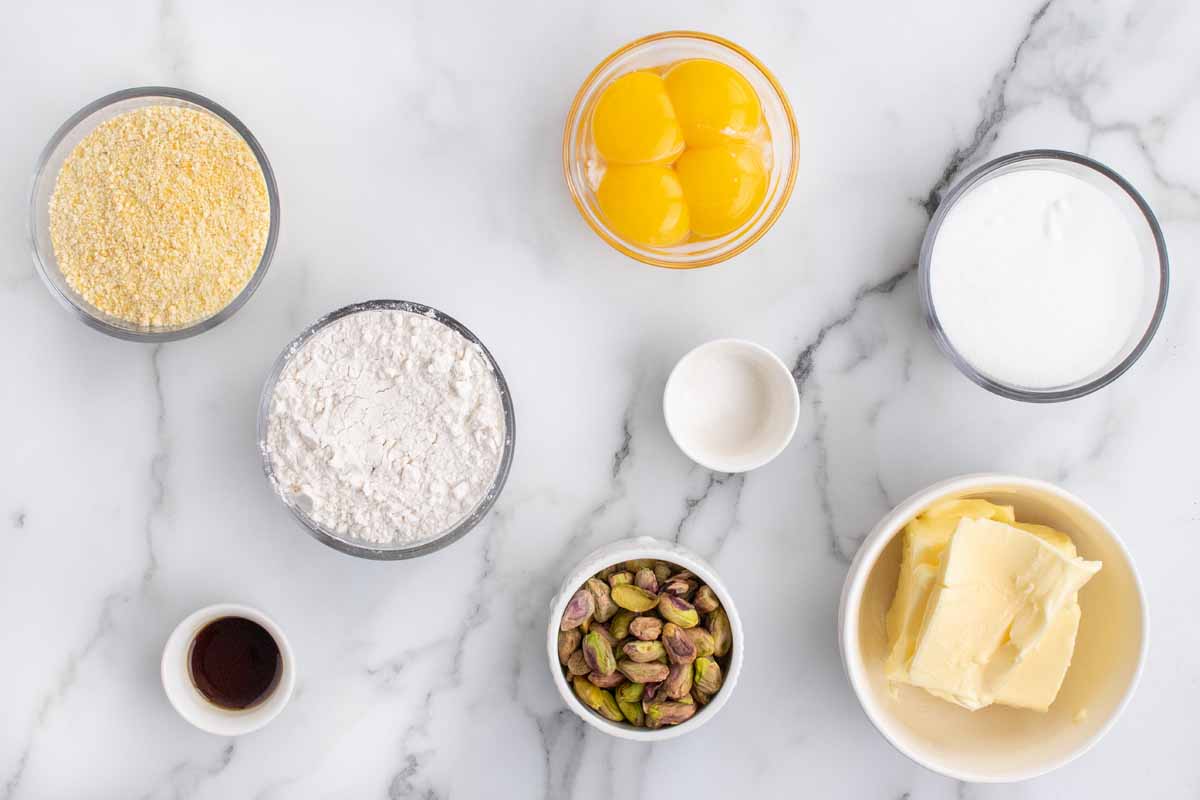 ingredients to make pistachio cornmeal cookies