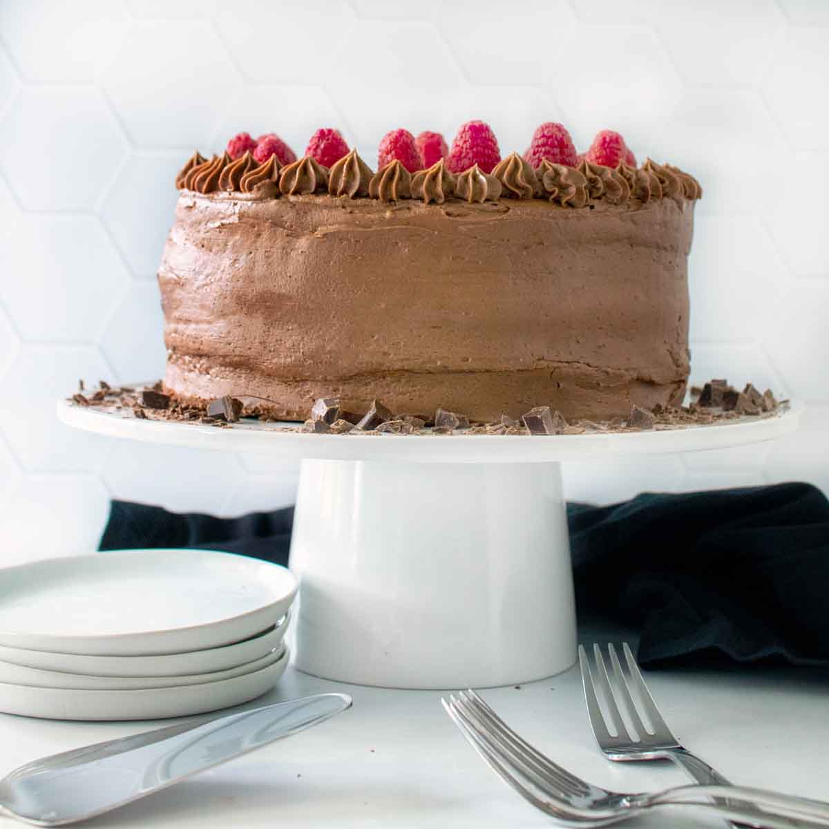 chocolate mousse cake on a cake stand