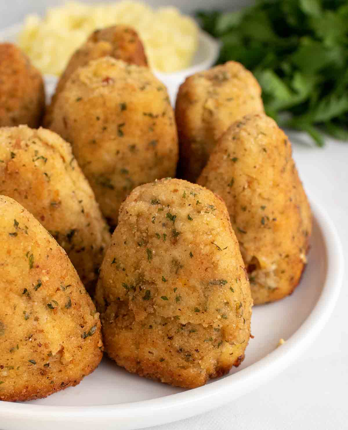 turkey croquettes on a white plate