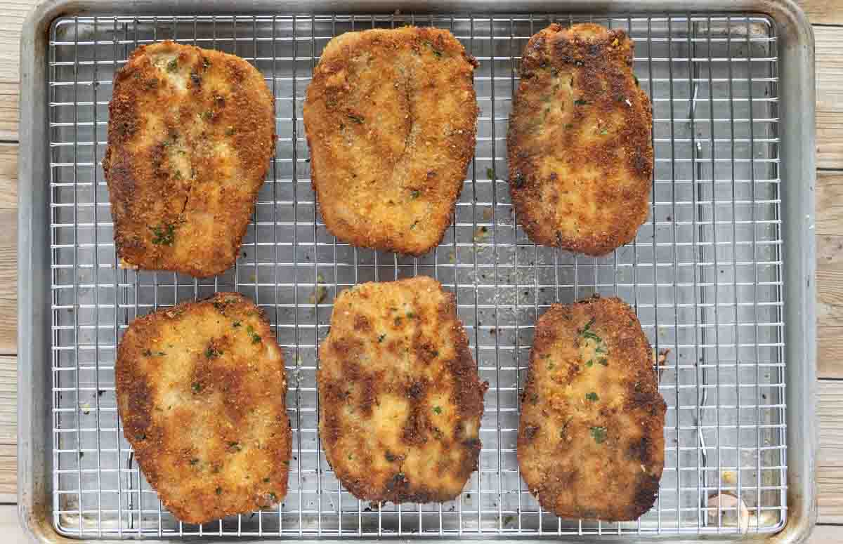 fried eggplant cutlets on a wire rack