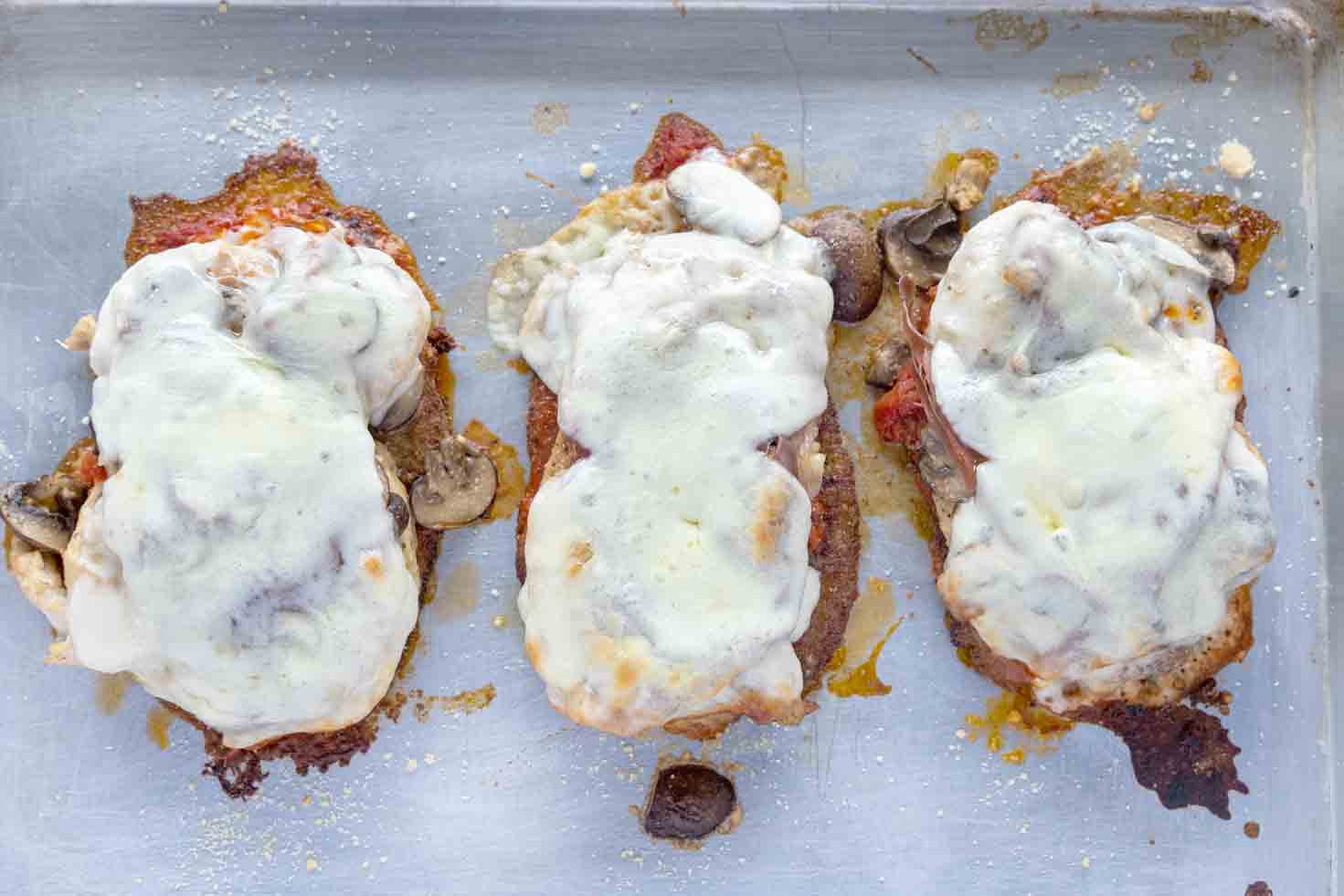 baked chicken sorrento on a sheet pan