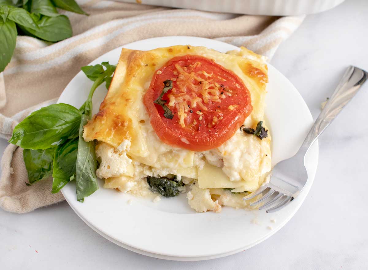 slice of vegetable lasagna on a white plate