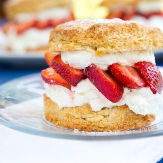Individual Strawberry Shortcake with whipped cream, strawberries, scones, National dairy month