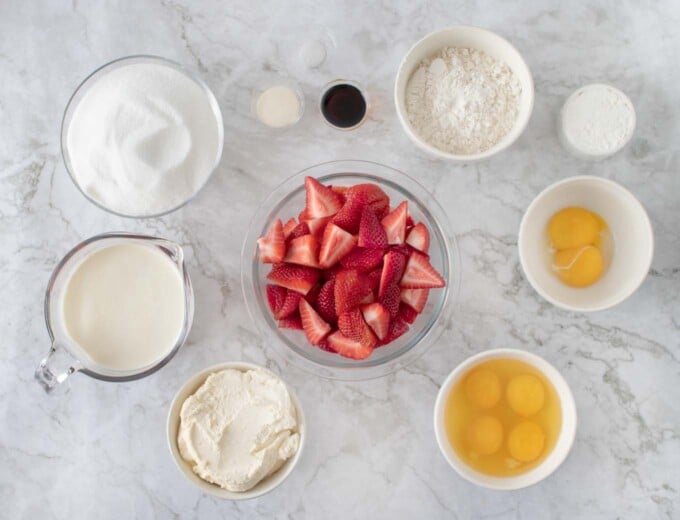 overhead view of ingredients to make strawberry cream cake