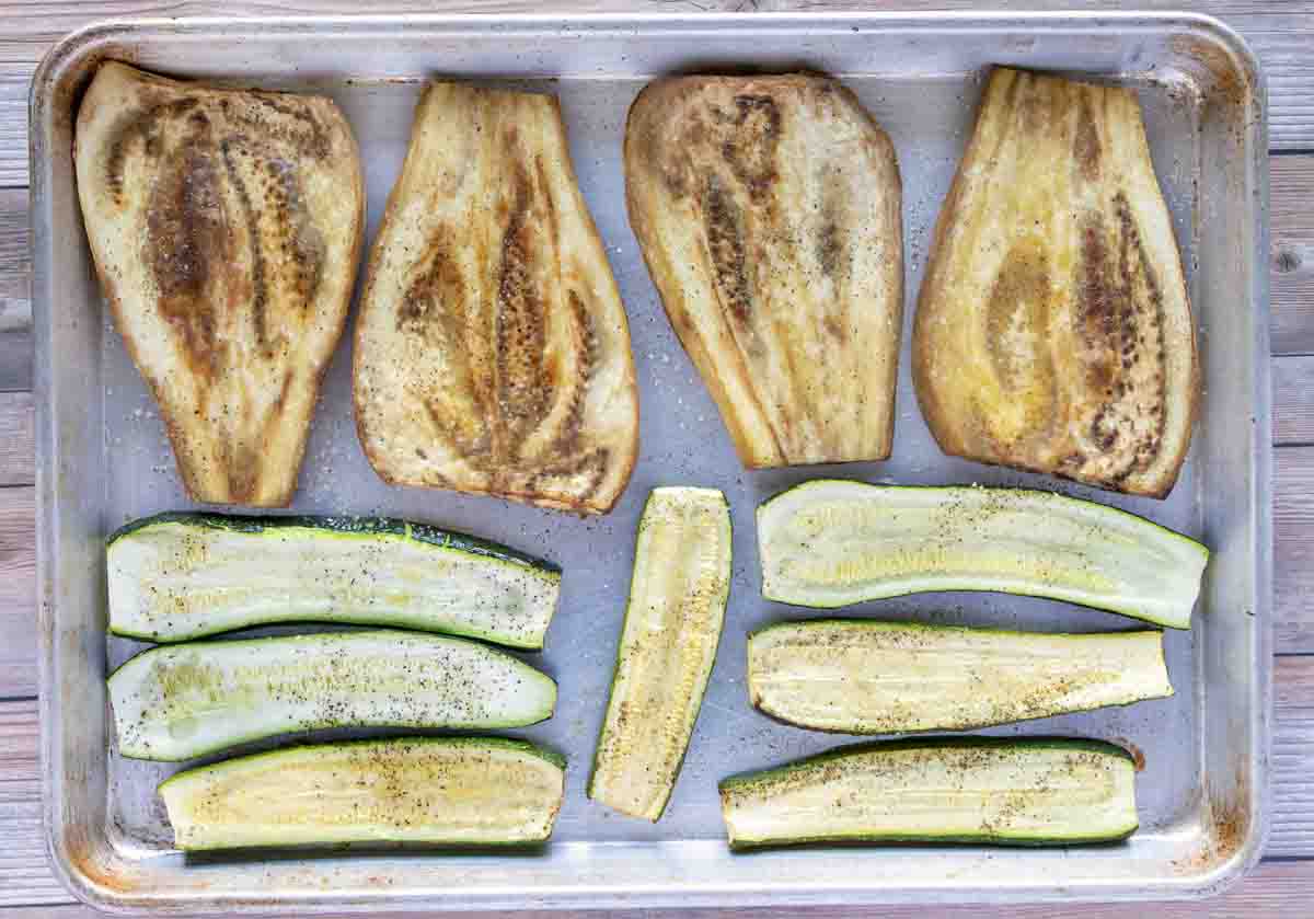 roasted eggplant and zucchini planks on a sheet pan