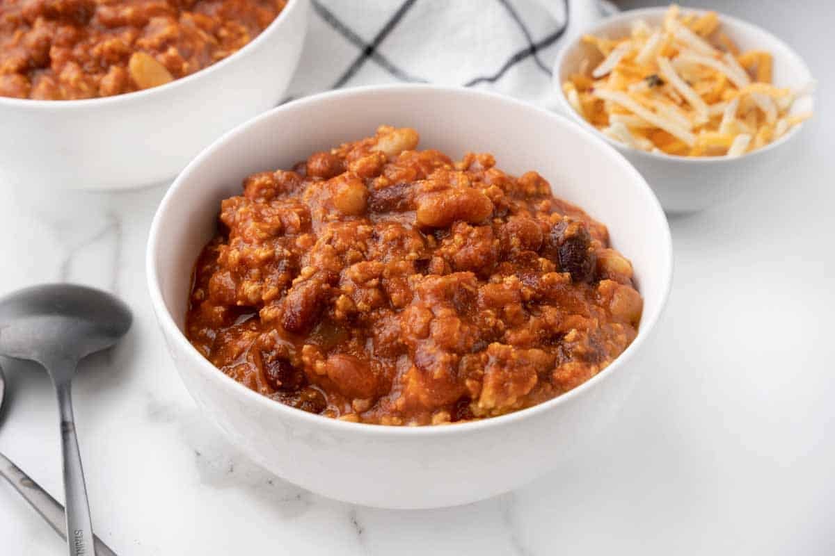 chicken chili in white bowl