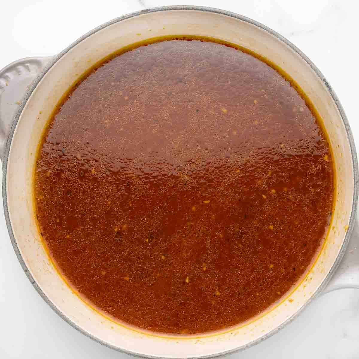 liquid from slow cooker in saucepan