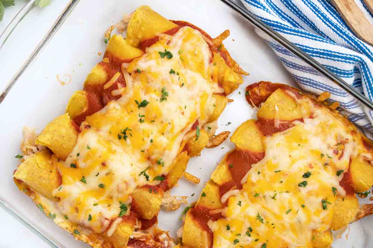 Cooked Tex-Mex Chicken enchiladas in a baking dish.