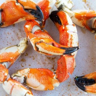 cooked jonah crab claws on white plate