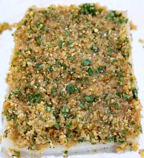 halibut with bread crumb mixture on a baking pan