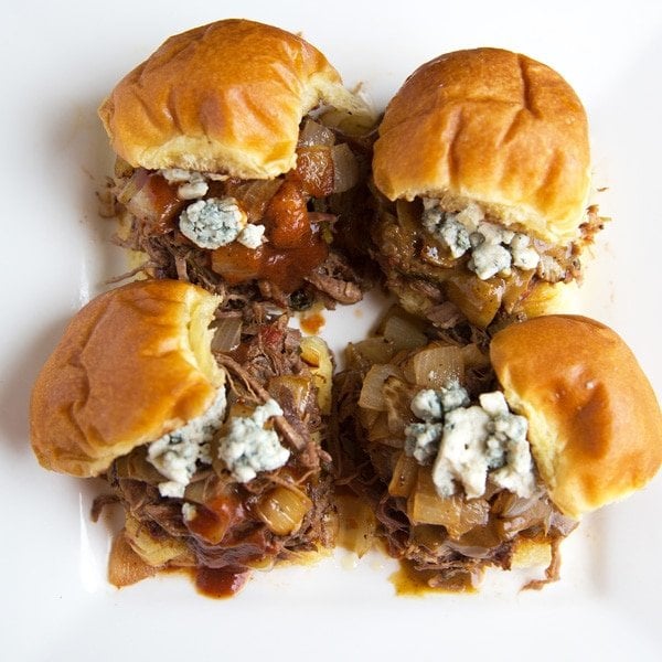 overhead view of Wild Boar Sliders with caramelized onion, bleu cheese crumbles and bbq sauce