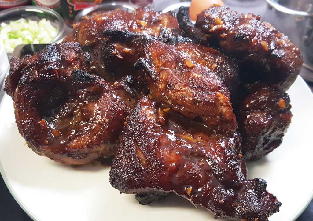 cooked Chinese barbecued pork on a white plate