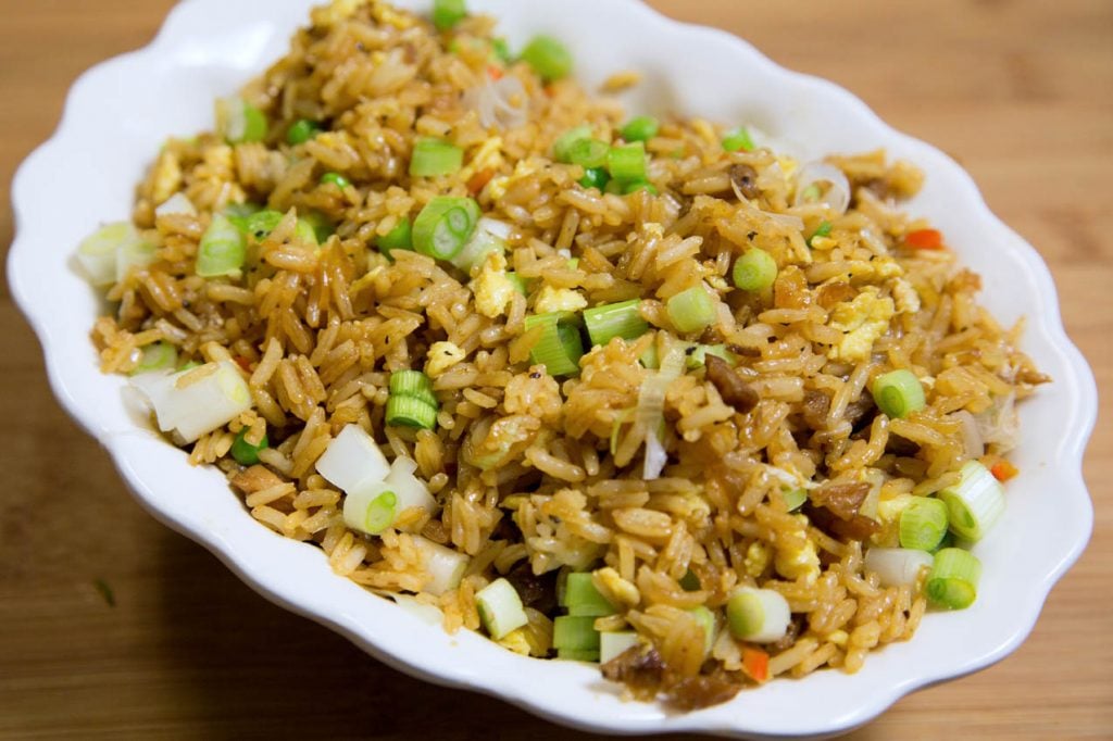 Pork fried rice in a white bowl