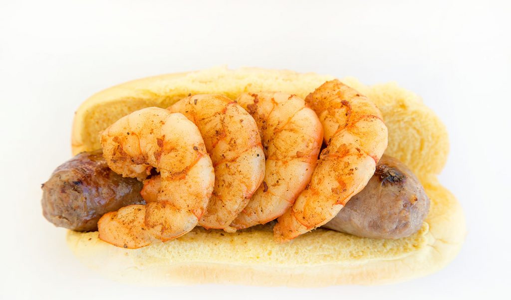 grilled Brats topped with grilled shrimp