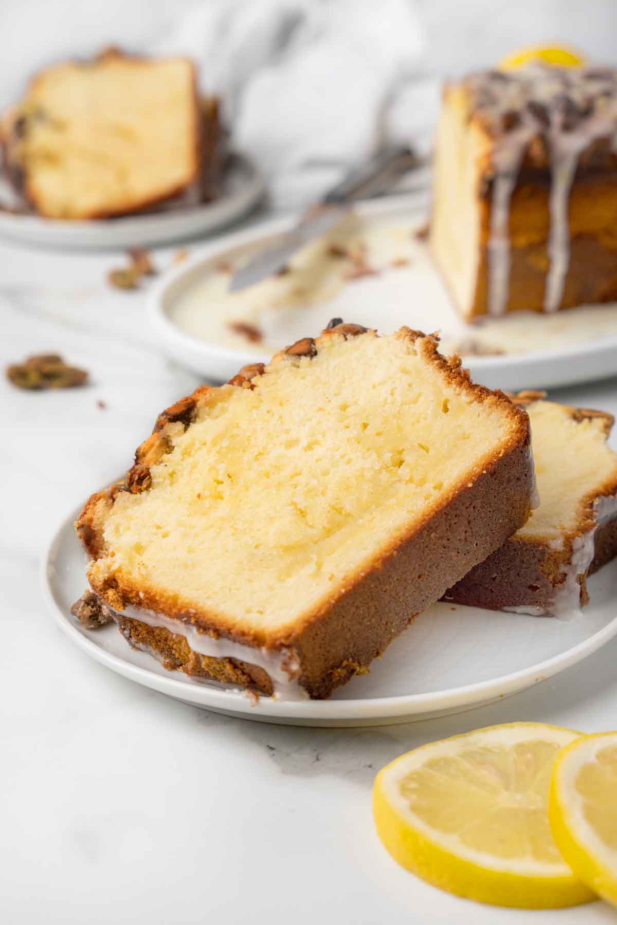 slices of lemon pound cake on a white plate