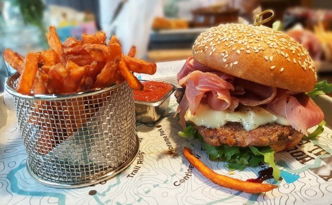 bison burger with proscuitto and an order of sweet potato fries