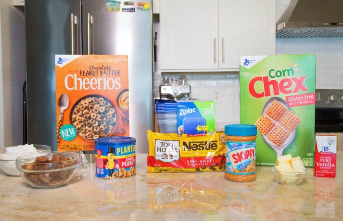 ingredients to make chex muddy buddies sitting on a kitchen counter