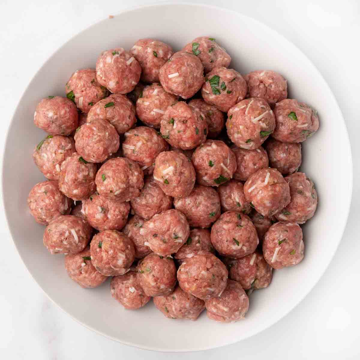 pile of mini meatballs in white bowl