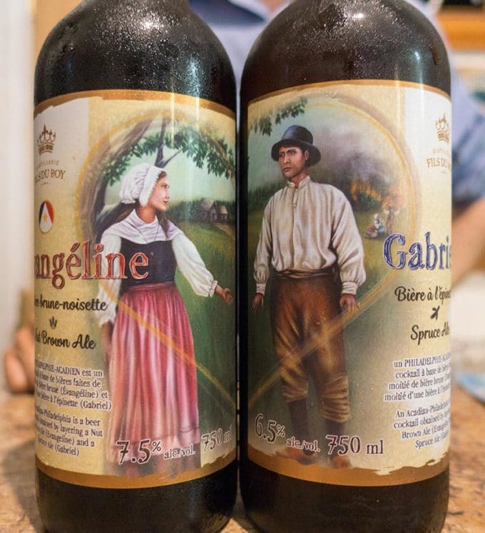 pictures of a man and a woman, each on a beer bottle dressed in 18th century clothing