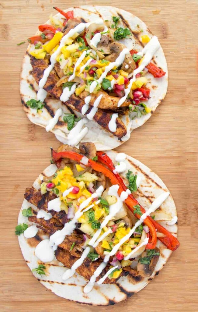 grilled chicken fajitas on a cutting board