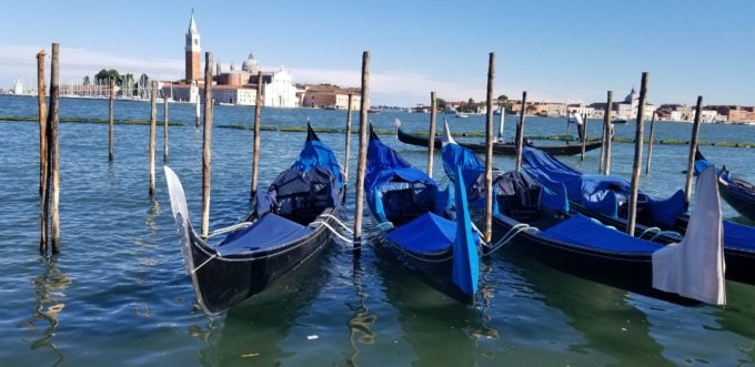 blue gondolas on the grand canal in Venice