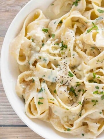 Fettuccine Alfredo in a white bowl.