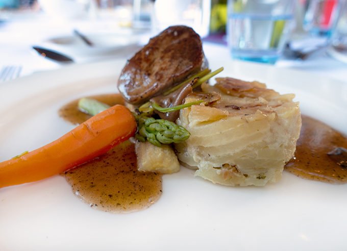 filet mignon of veal with vegetables on a white plate