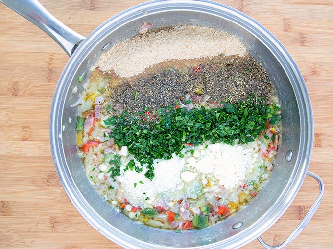 seasonings added to the ingredients in a large saute pan