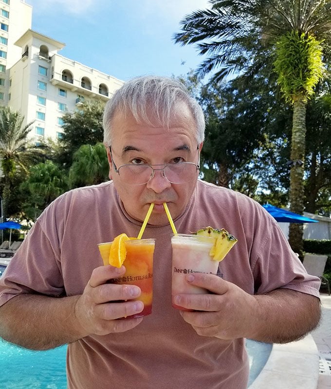 chef Dennis by the pool with two margaritas at the omni resort championsgate