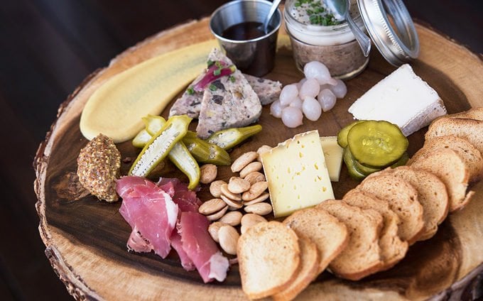 charcuterie on a wooden board at Preserved Restaurant