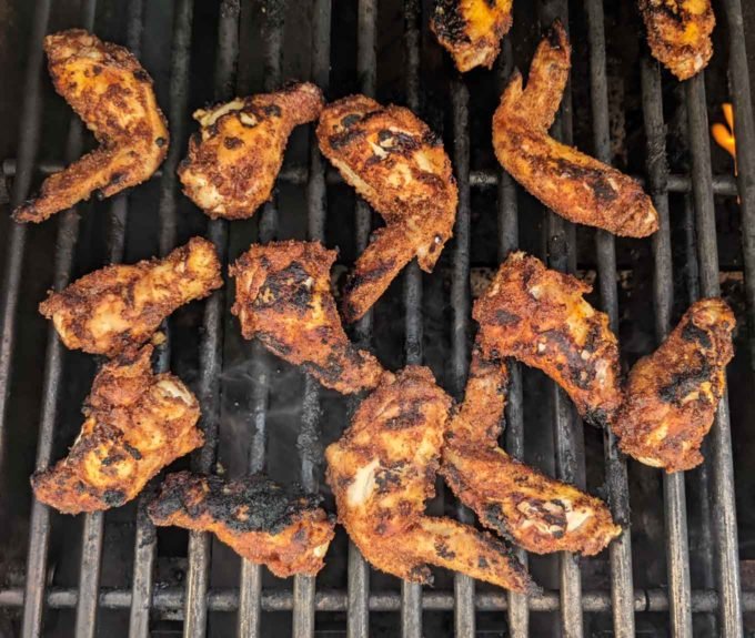 overhead view of chicken wings on the grill