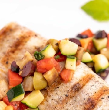 close up of grilled mahi-mahi with caponata