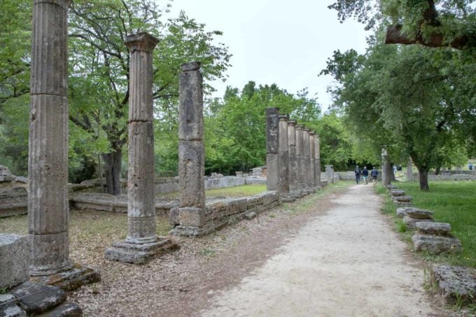 pathway with columns in ruins in Oylmpia Greece