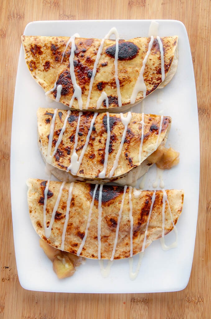 apple pie foldovers on white platter