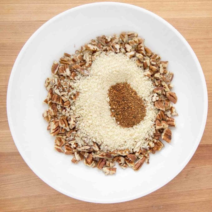 ingredients for pecan topping in a white bowl