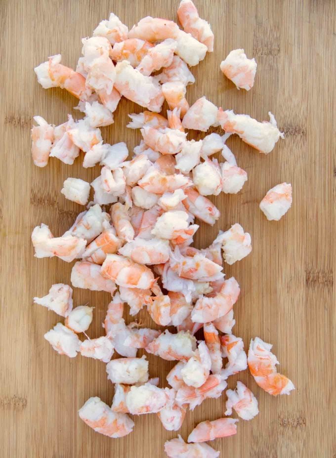 chopped shrimp on a cutting board