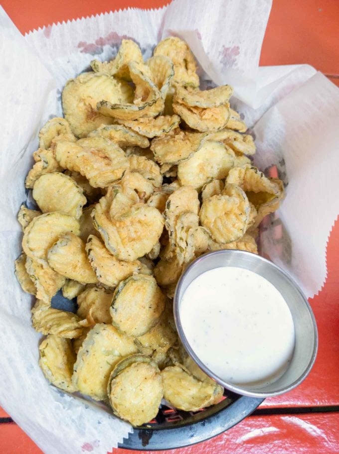 basket of fried pickles with ranch dressing