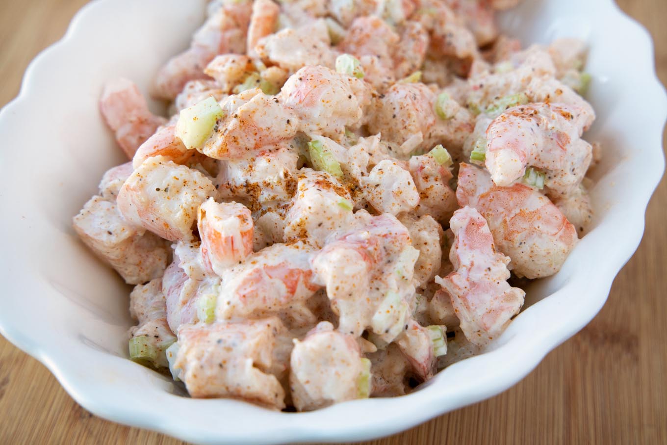 shrimp salad in white bowl