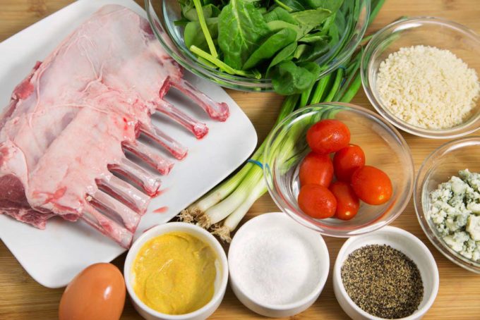 ingredients to make stuffed rack of lamb on a cutting board